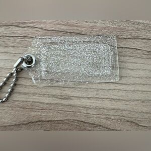 Coach Poppy Glitter XXL hang tag Glittery Silver bag charm keychain